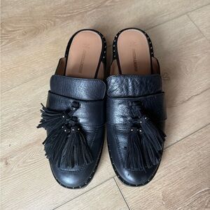 Johnston & Murphy Alice Fringe Mules in black calfskin leather